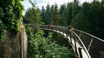 guests on Cliffwalk during park hours at Capilano Suspension Bridge Park